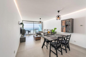 Serene Seaview Retreat in Higueron: 2BR Oasis